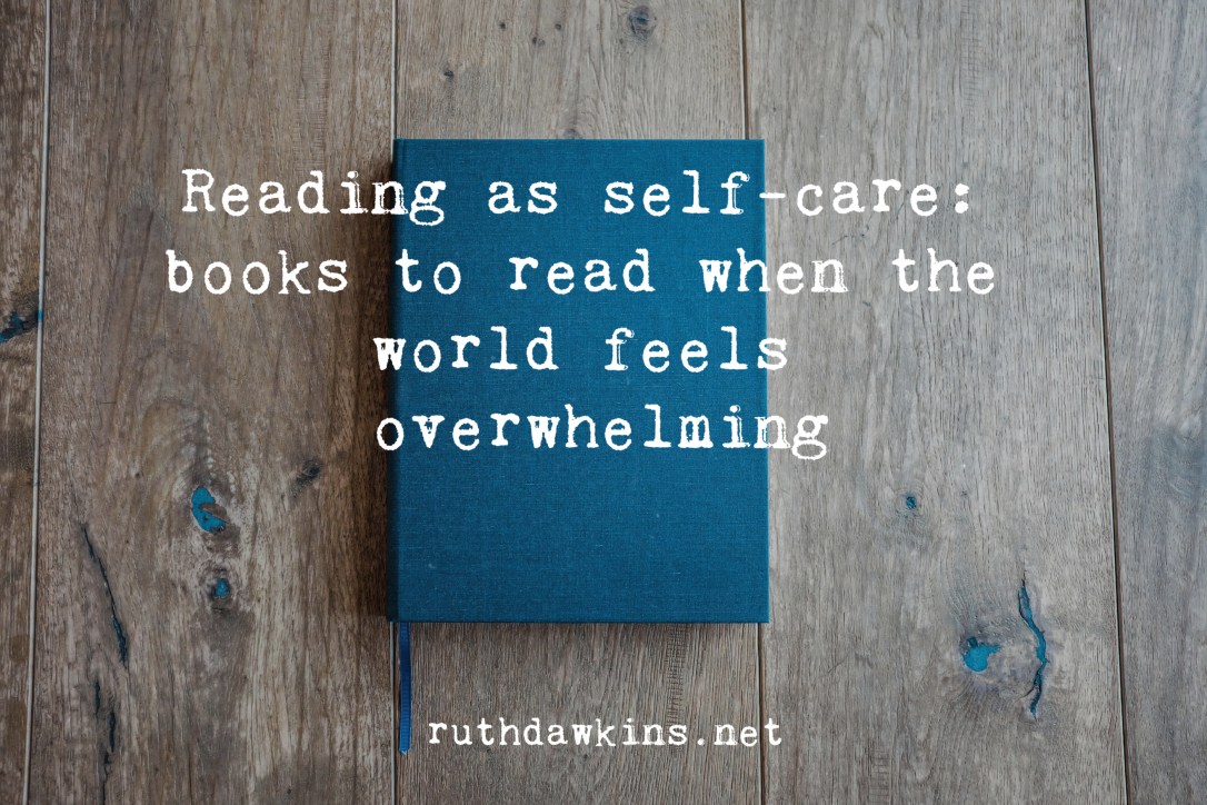 a blue book on wooden table with the text 'reading as self-care: what to read when the world feels overwhelming'